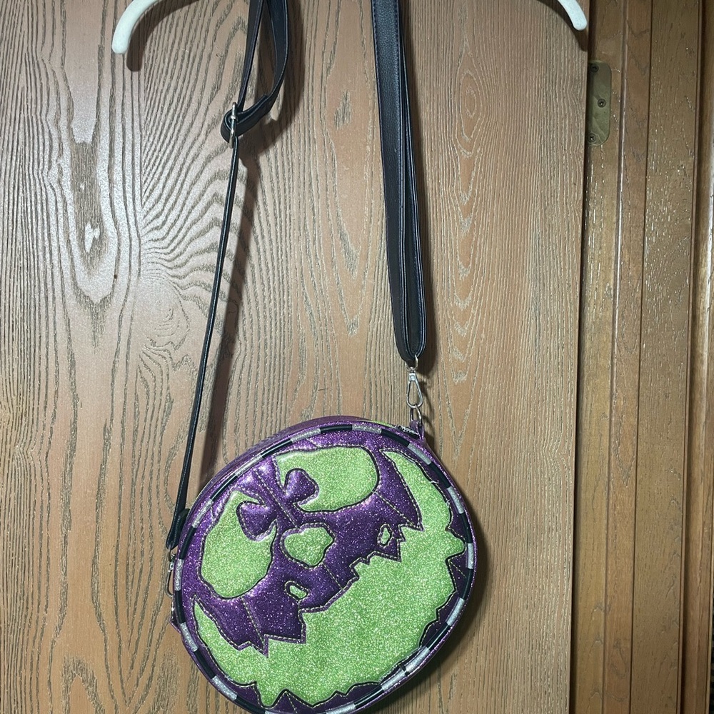 Purple and Green Love Pain and Stitches pumpkin bag